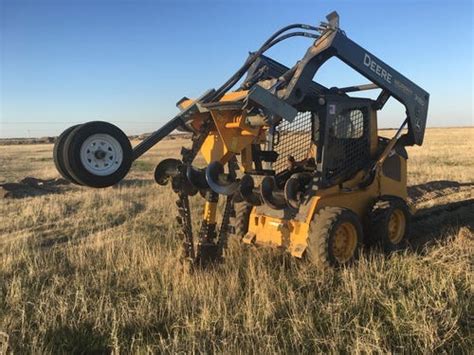 bainter skid steer trencher|skid steer trencher attachments.